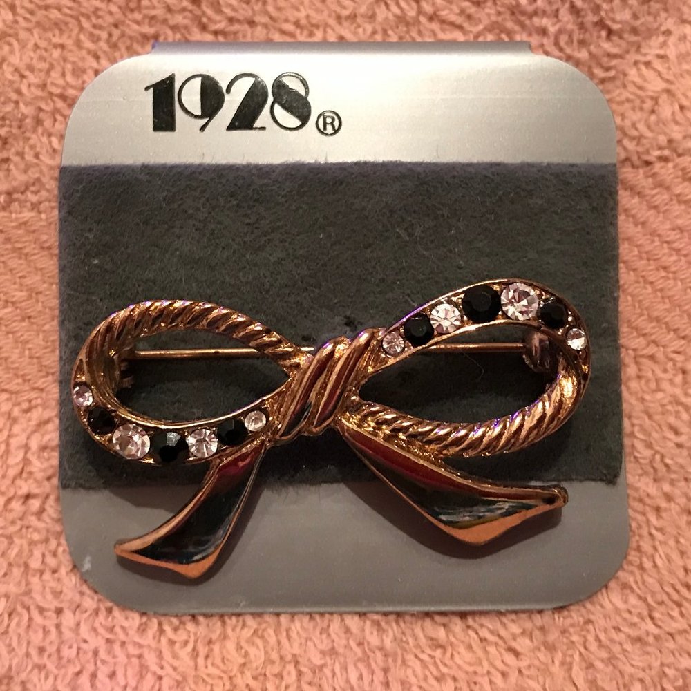 VTG 1928 Gold Bow Pin with Black + Clear Stones